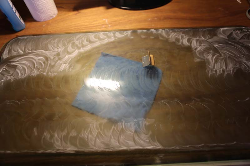 3 - 2eme ponçage  papier de verre a l'eau grains 2000.JPG