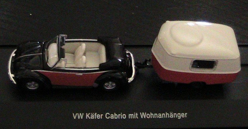 Puck tractée par une cox décapotable